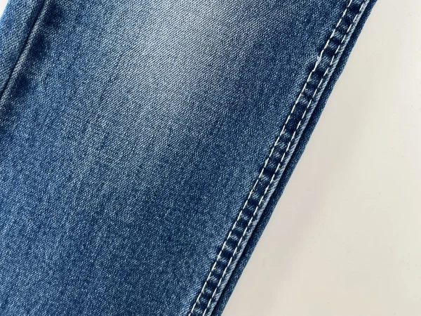 Denim elástico medio de 11 oz para caballero con hilo de buena calidad