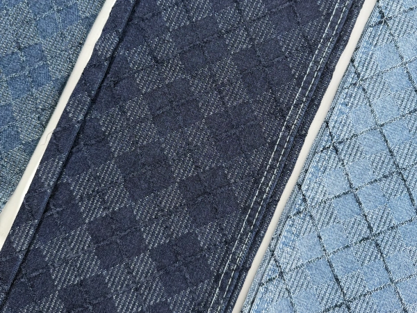 dark-wash-geometric-jacquard-denim-fabric-closeup.