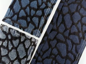 Comparison of light wash and dark wash textured denim fabric showing erosion-inspired chenille surface effects.