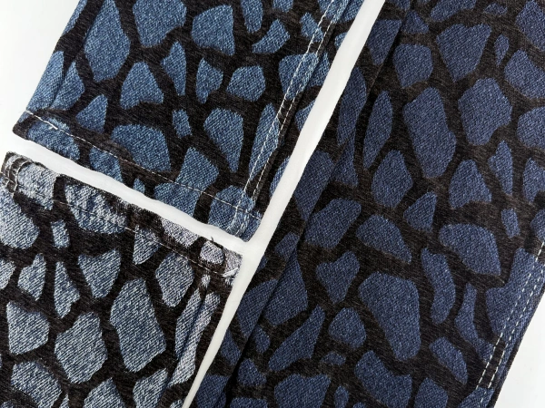 Comparison of light wash and dark wash textured denim fabric showing erosion-inspired chenille surface effects.